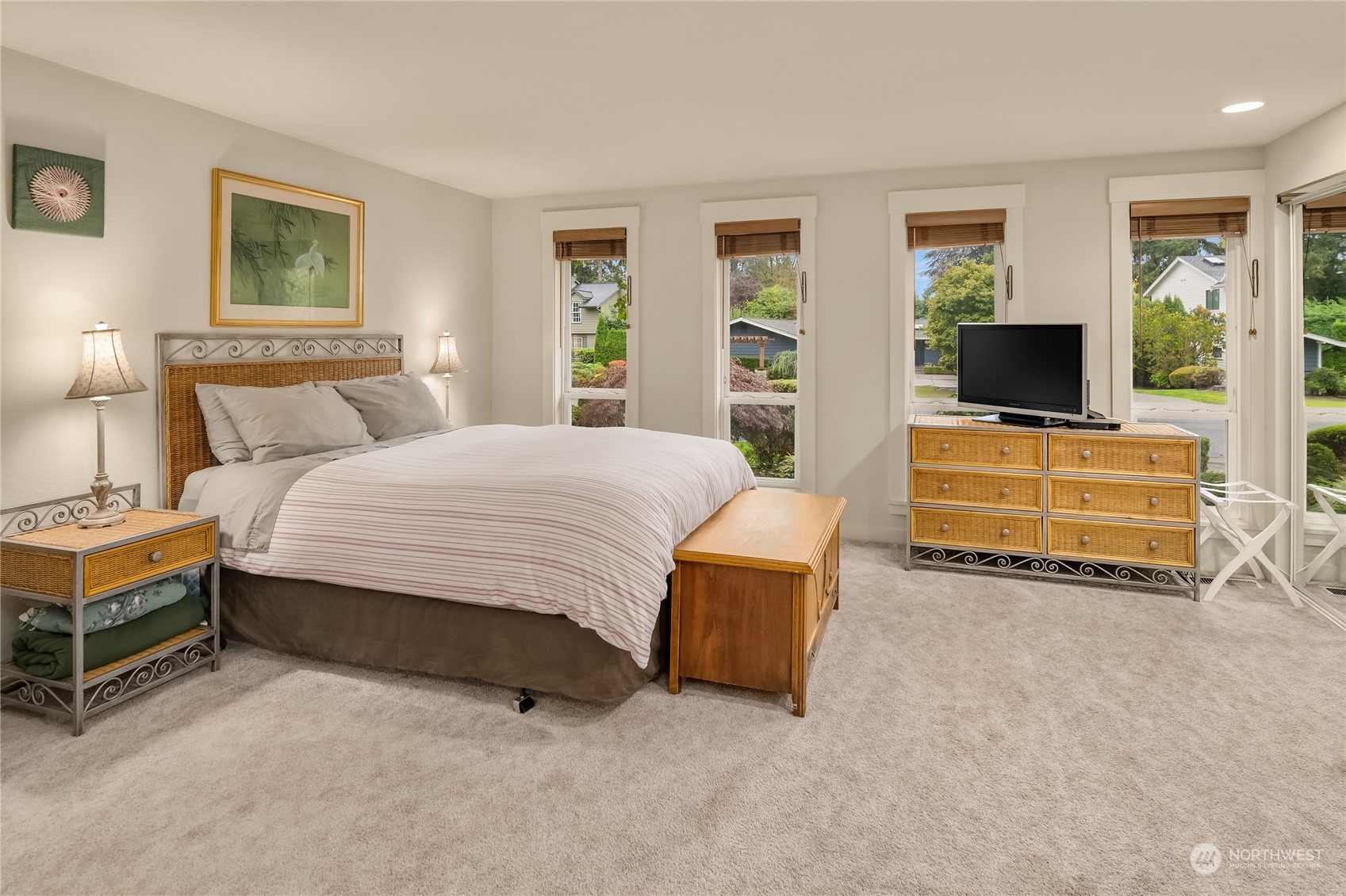 20 Cascade Key Bellevue, WA 98006 - Photo 16 of 38 a bedroom with a bed and a flat screen tv