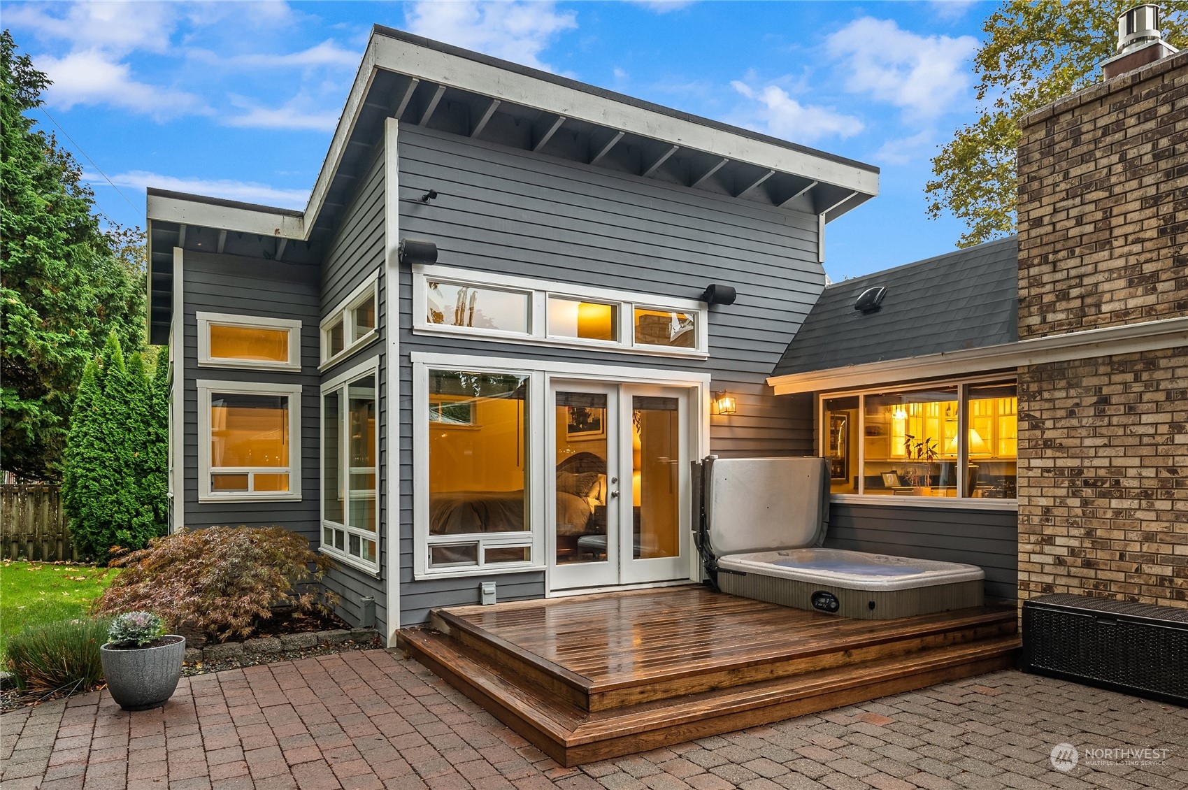 20 Cascade Key Bellevue, WA 98006 - Photo 26 of 38 a view of house with a large window and potted plants