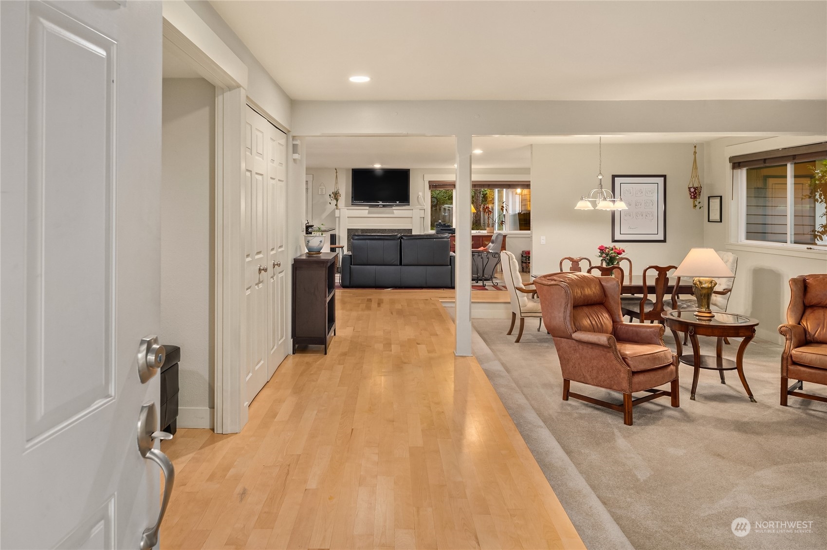 20 Cascade Key Bellevue, WA 98006 - Photo 3 of 38 a living room with furniture a flat screen tv and kitchen view