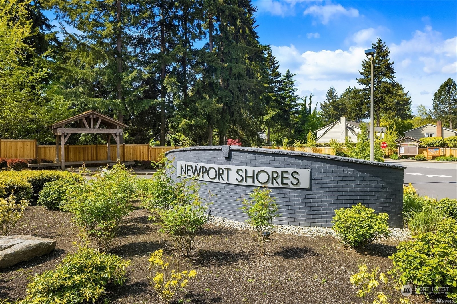 20 Cascade Key Bellevue, WA 98006 - Photo 37 of 38 a street sign that is sitting in front of flowers