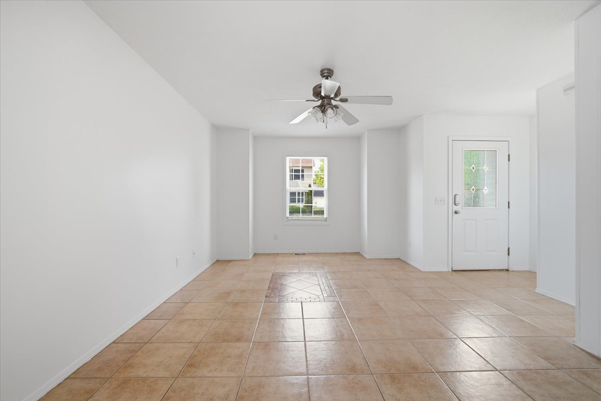 915 Teegan Street Normal, IL 61761 - Photo 7 of 33 a view of an empty room with a window