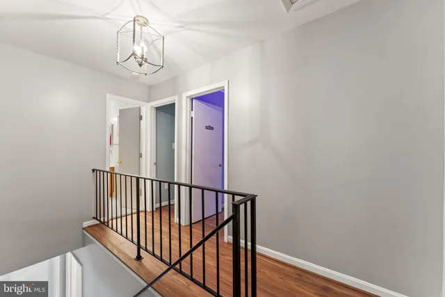 a view of entryway with wooden floor