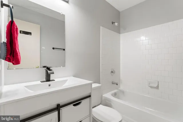 a bathroom with a sink and a bathtub