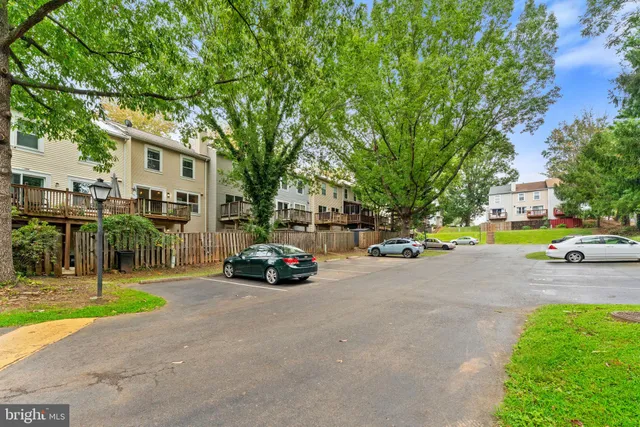 a view of street with parked cars