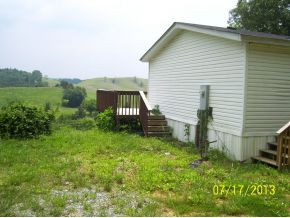 70 Elmwood Road Midway, TN 37809 - Photo 2 of 3 R side view