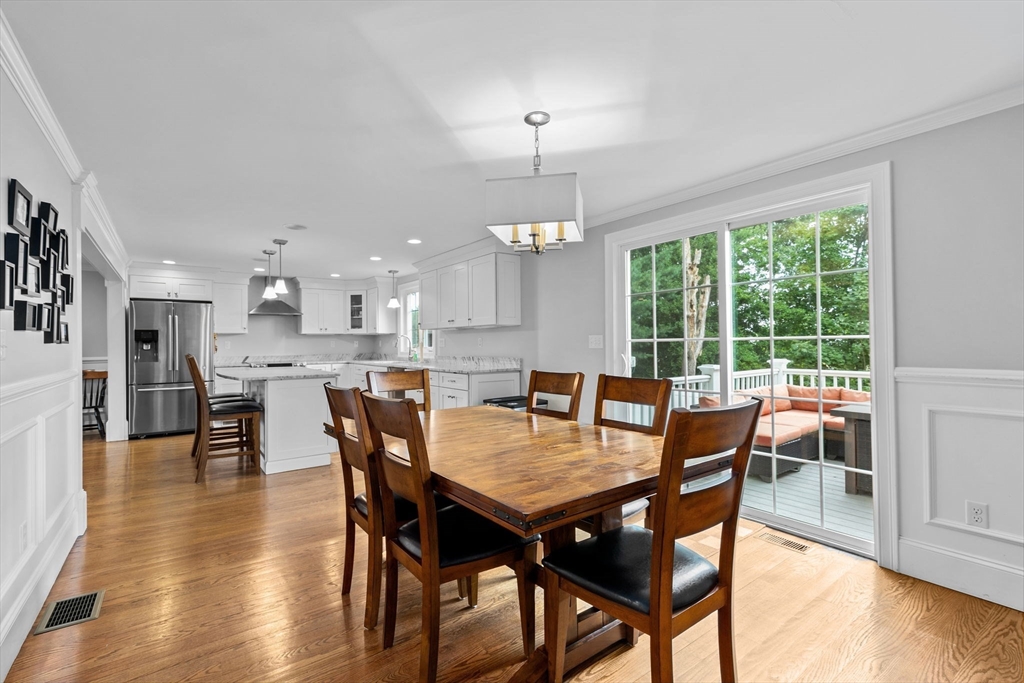 48 Atwill Road Boston, MA 02132 - Photo 12 of 36 a view of a dining room with furniture window and wooden floor