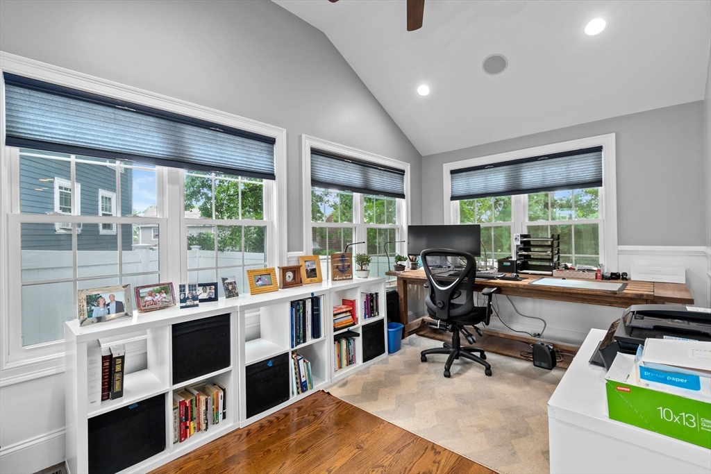 48 Atwill Road Boston, MA 02132 - Photo 14 of 36 a view of a workspace with furniture and a window