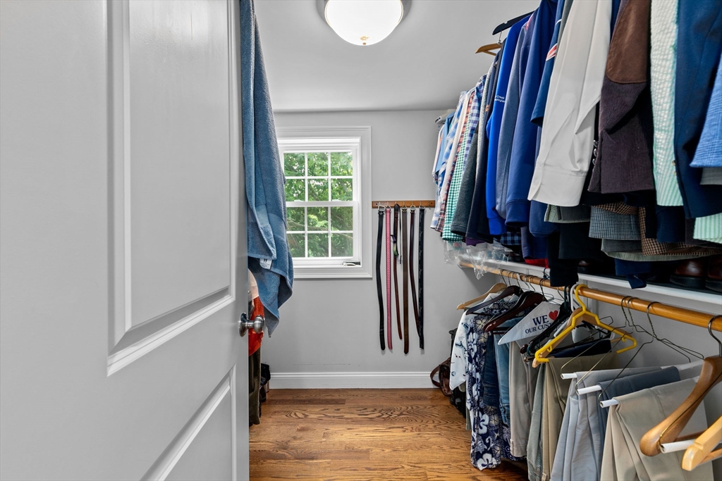 48 Atwill Road Boston, MA 02132 - Photo 18 of 36 a view of walk in closet with clothes and shoes