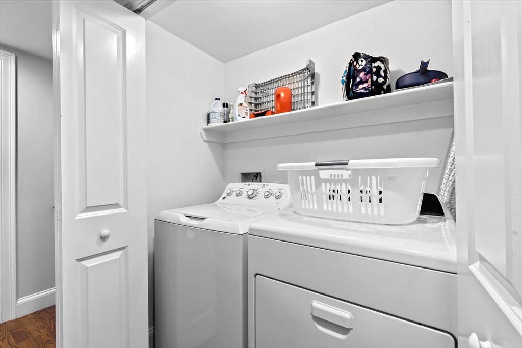 48 Atwill Road Boston, MA 02132 - Photo 21 of 36 a utility room with dryer and washer