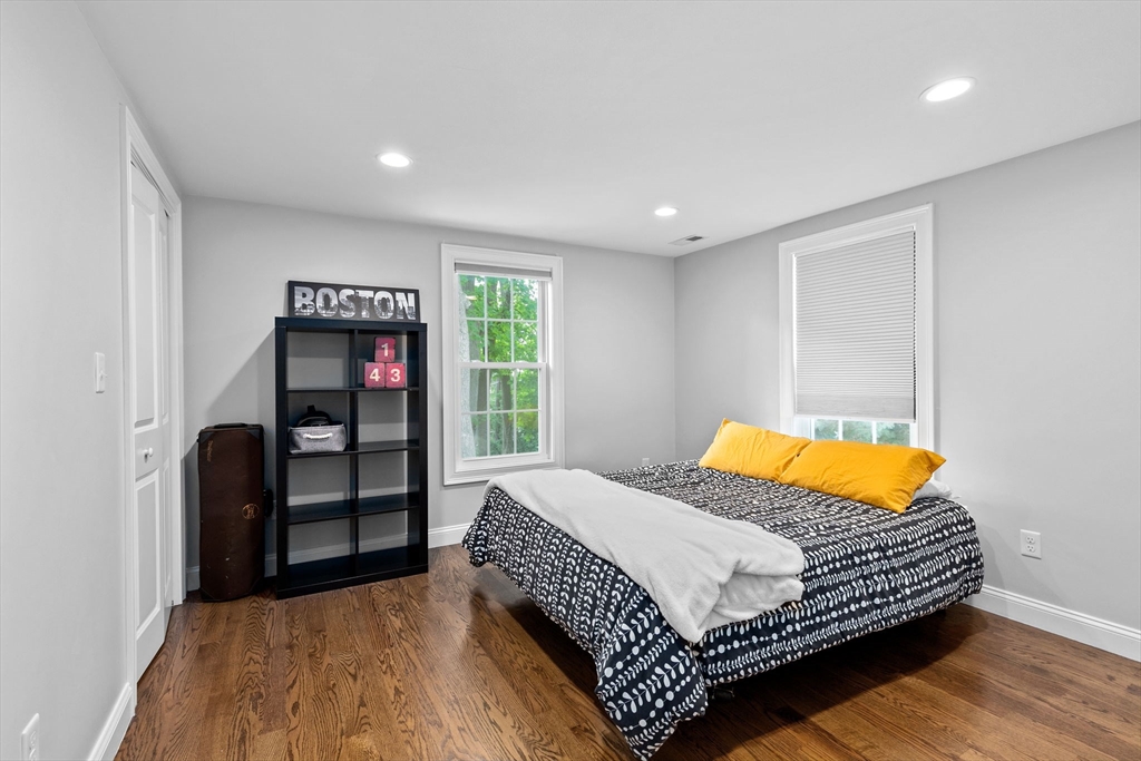 48 Atwill Road Boston, MA 02132 - Photo 23 of 36 a bedroom with a bed and closet