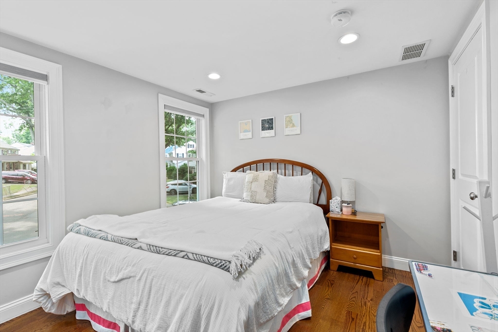 48 Atwill Road Boston, MA 02132 - Photo 28 of 36 a bedroom with a bed and a window