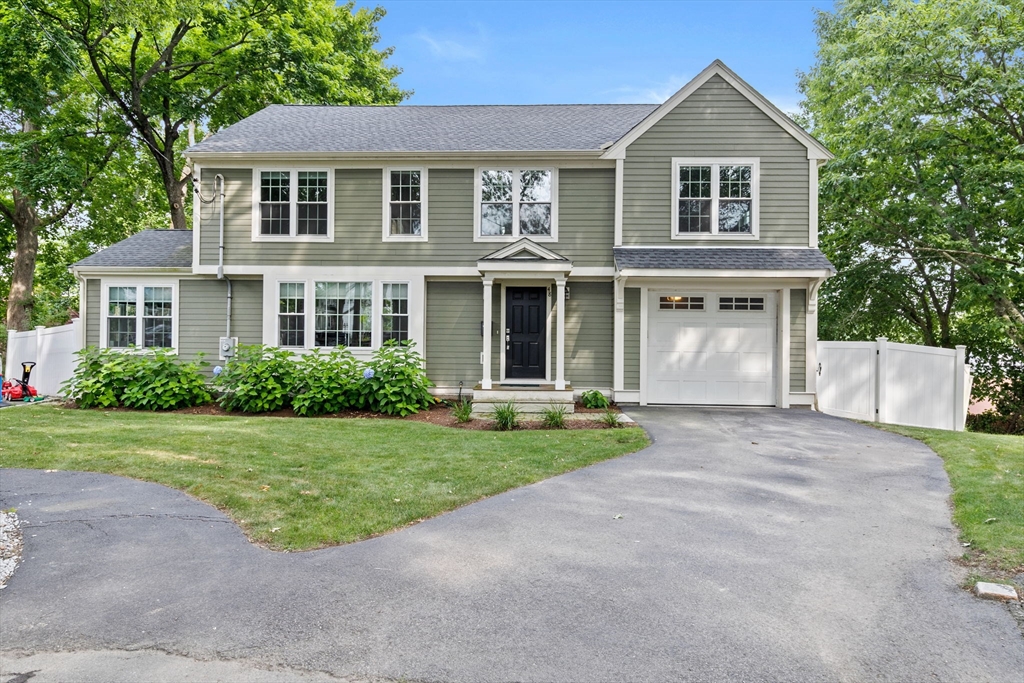 48 Atwill Road Boston, MA 02132 - Photo 36 of 36 front view of a house with a yard