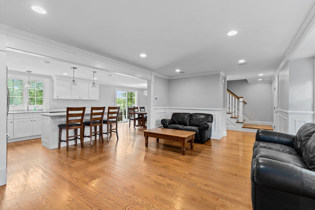 48 Atwill Road Boston, MA 02132 - Photo 5 of 36 a living room with furniture and wooden floor