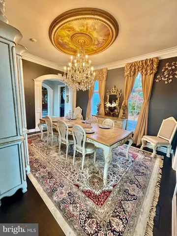 a kitchen with stainless steel appliances a stove a sink and a refrigerator