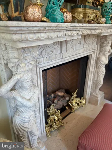 a bathroom with a toilet a double vanity sink and a mirror