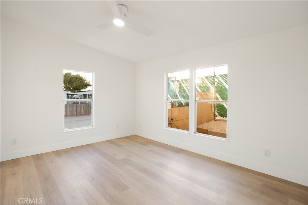 10350 Base Line Road, Unit 128 Rancho Cucamonga, CA 91701 - Photo 20 of 24 an empty room with windows