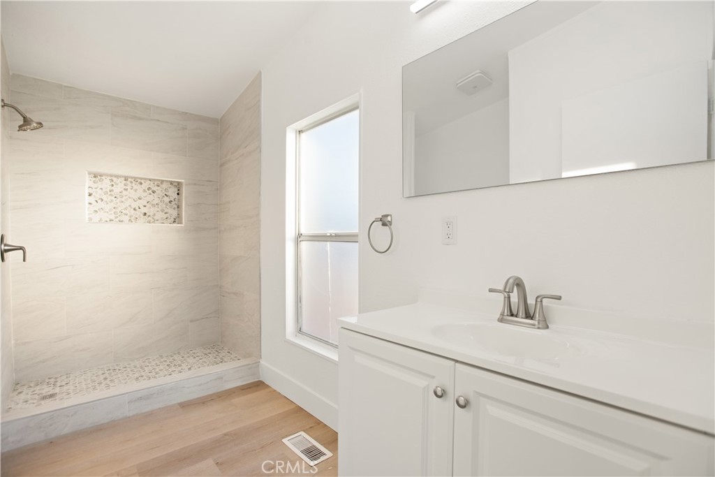 10350 Base Line Road, Unit 128 Rancho Cucamonga, CA 91701 - Photo 23 of 24 a bathroom with a sink and shower