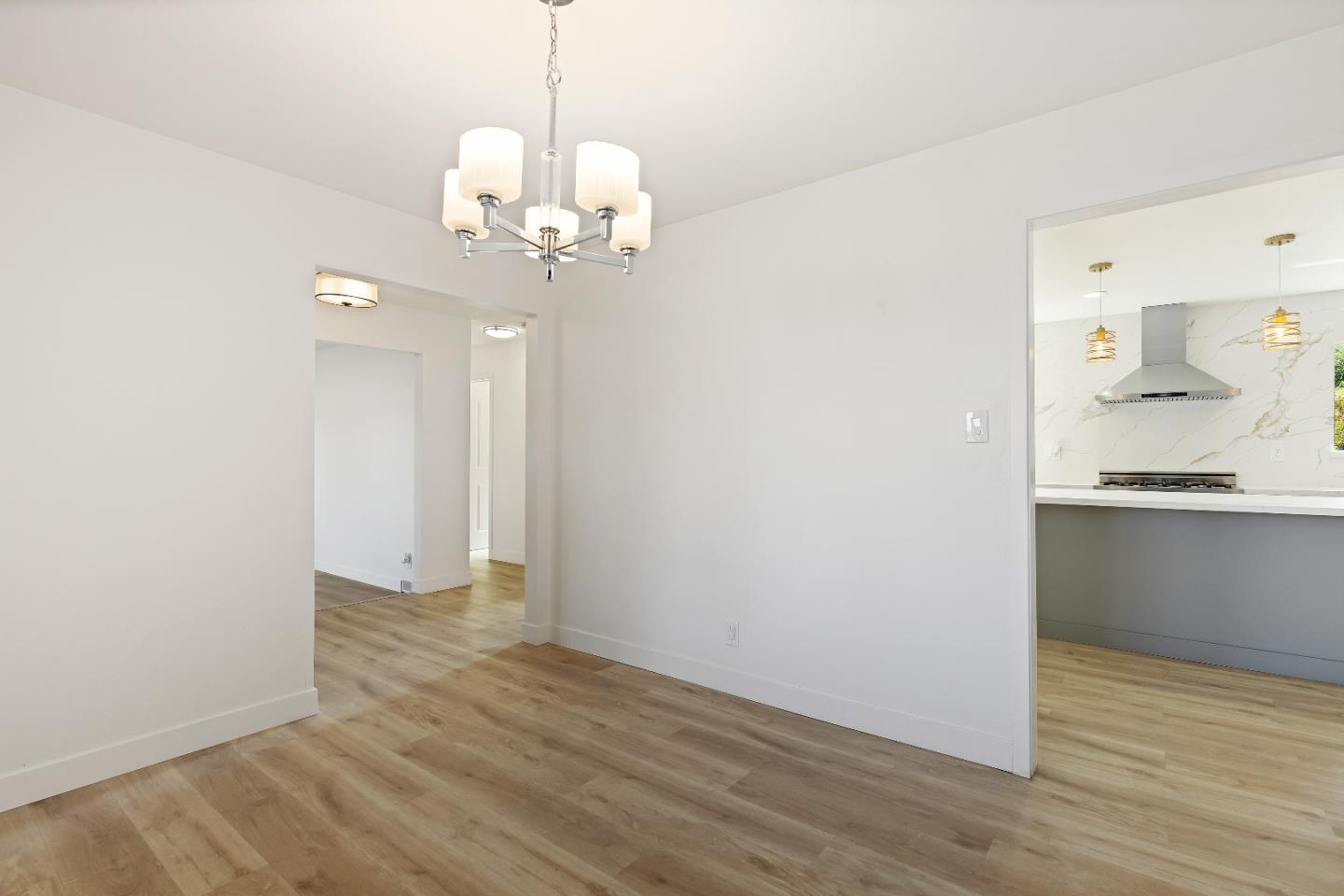 1238 Steven Drive Pittsburg, CA 94565 - Photo 13 of 39 a view of kitchen with granite countertop cabinets and wooden floor