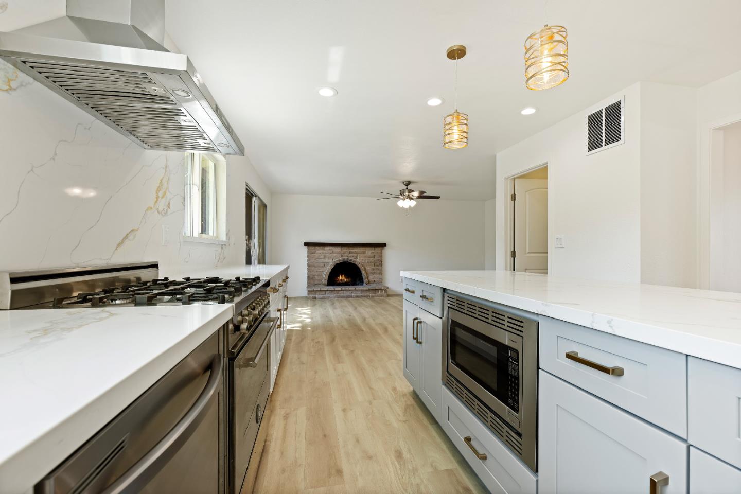1238 Steven Drive Pittsburg, CA 94565 - Photo 17 of 39 a kitchen with a stove and a sink