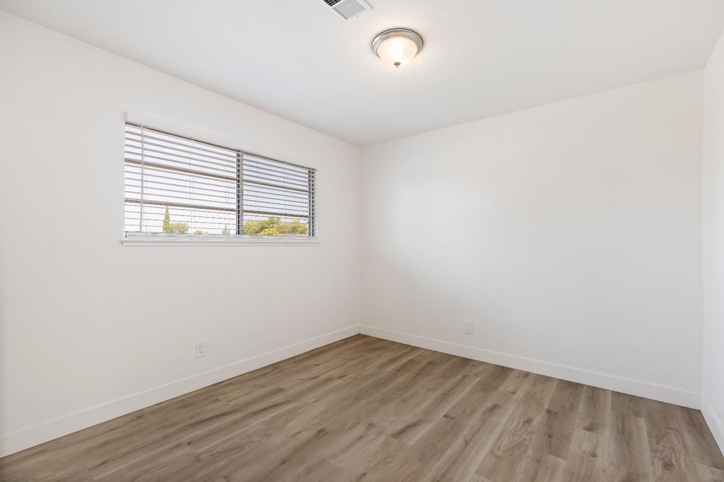1238 Steven Drive Pittsburg, CA 94565 - Photo 32 of 39 an empty room with a window