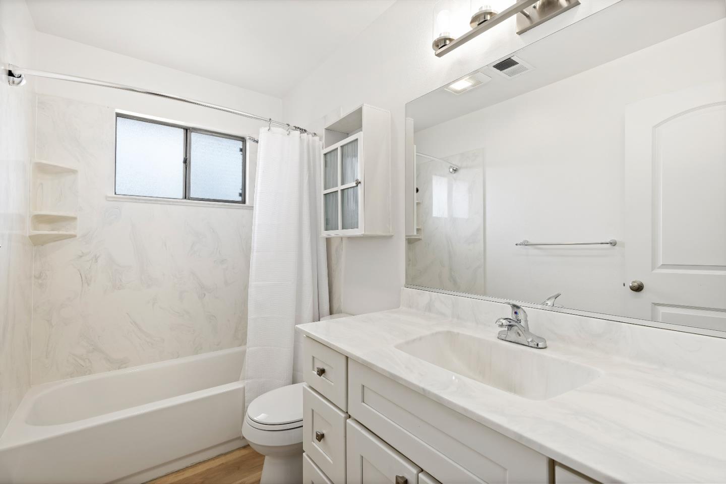 1238 Steven Drive Pittsburg, CA 94565 - Photo 34 of 39 a bathroom with a sink a toilet and shower