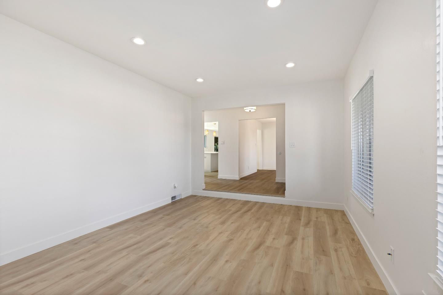 1238 Steven Drive Pittsburg, CA 94565 - Photo 10 of 39 a view of an empty room with wooden floor