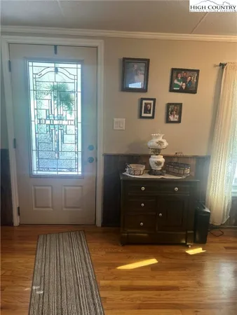 a living room with furniture and flat screen tv