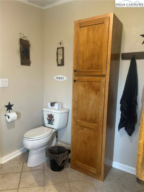 480 Fraser Road Sparta, NC 28675 - Photo 18 of 36 a bathroom with a toilet and a shower