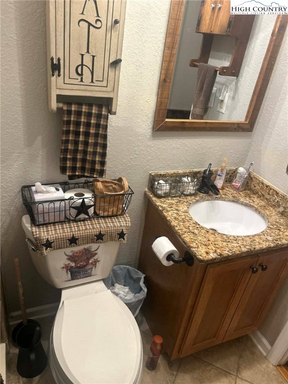 480 Fraser Road Sparta, NC 28675 - Photo 19 of 36 a bathroom with a toilet sink and mirror
