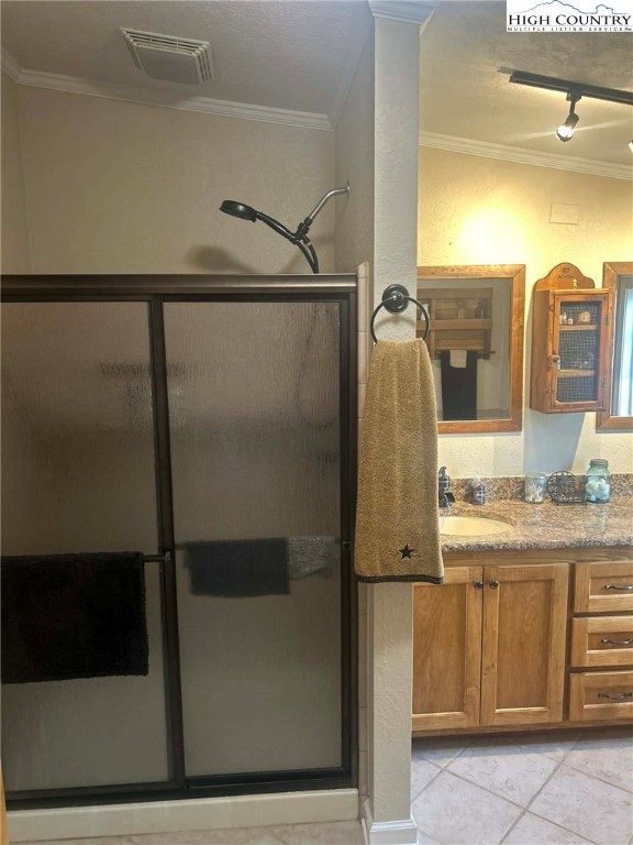 480 Fraser Road Sparta, NC 28675 - Photo 22 of 36 a bathroom with a granite countertop sink a mirror and shower