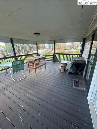 a view of swimming pool with a yard