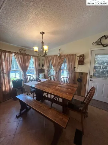 a kitchen with stainless steel appliances a refrigerator a stove a microwave a sink and dishwasher