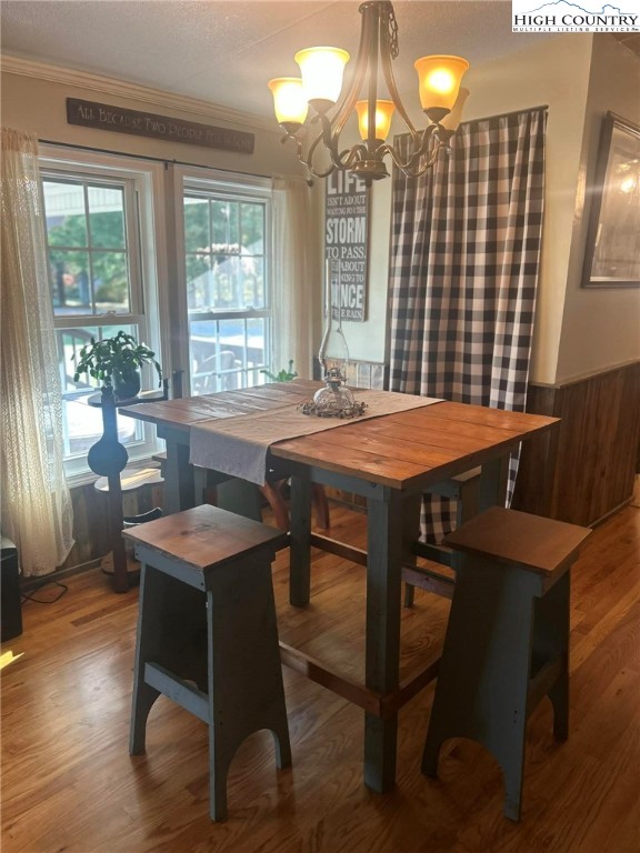 480 Fraser Road Sparta, NC 28675 - Photo 10 of 36 a dining room with a table chairs and a kitchen view