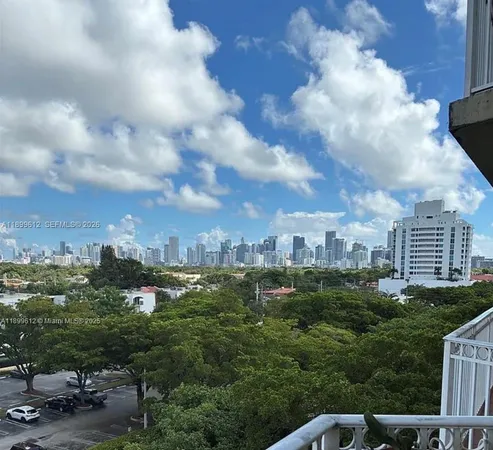 a view of a balcony with wooden floor