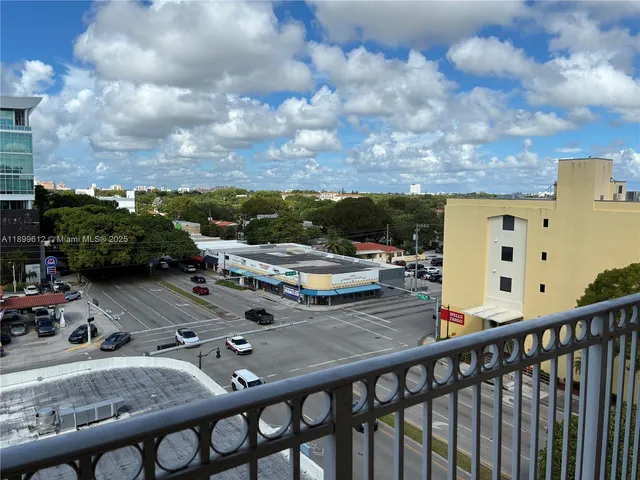 a view of balcony with furniture