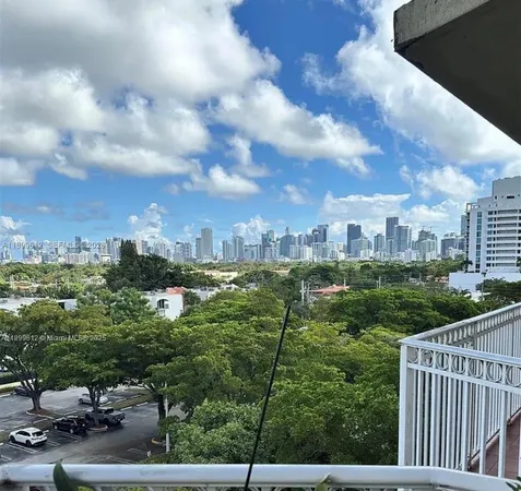 a view of livingroom with furniture and floor to ceiling window