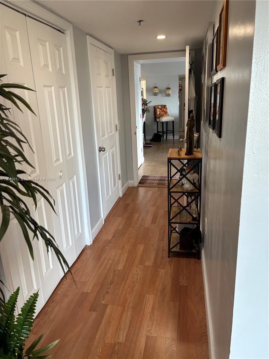 1650 Coral Way, Unit 808 Miami, FL 33145 - Photo 29 of 29 a view of hallway with furniture and stairs