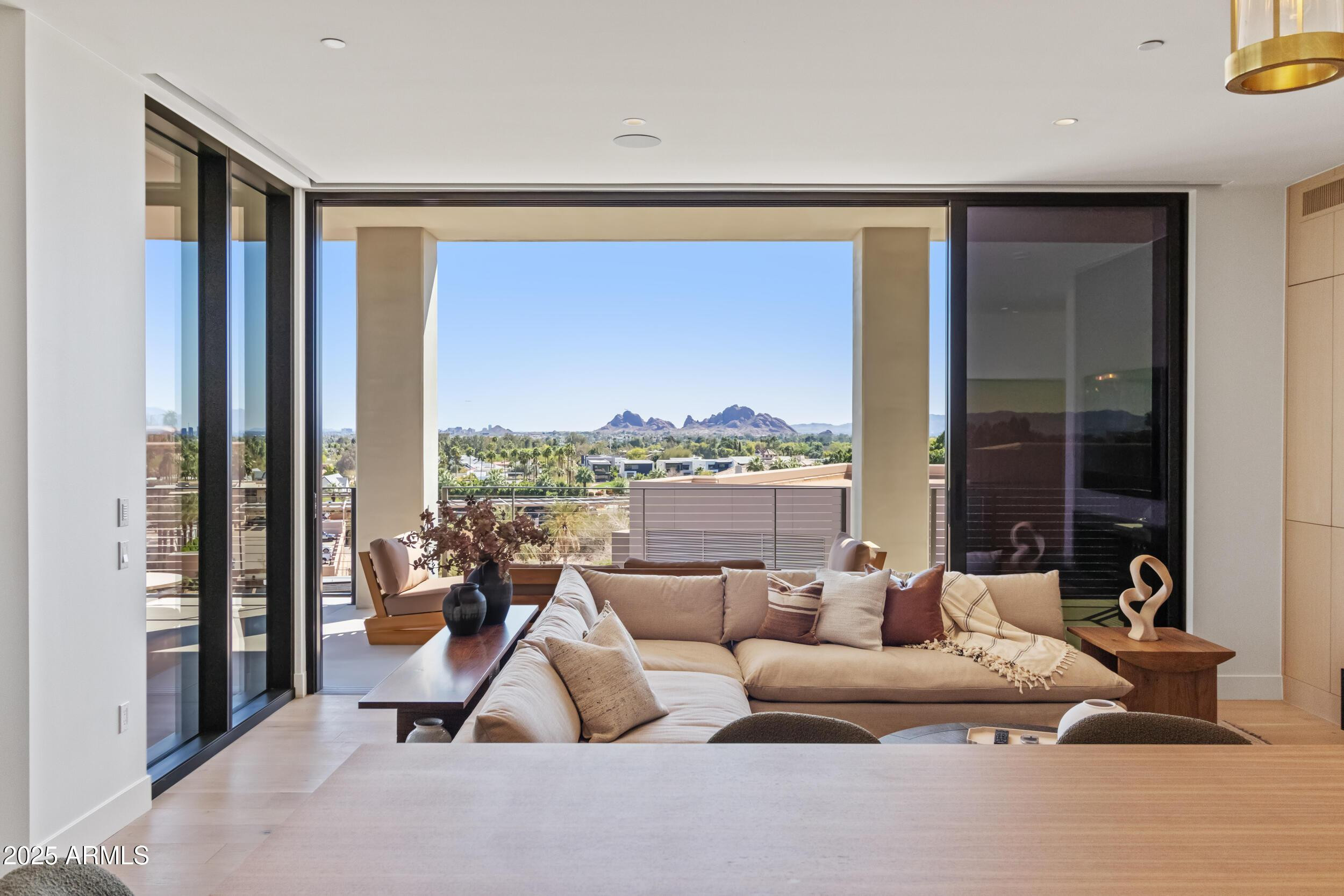 5000 North Camelback Ridge Drive, Unit 302 Scottsdale, AZ 85251 - Photo 6 of 42 a living room with furniture