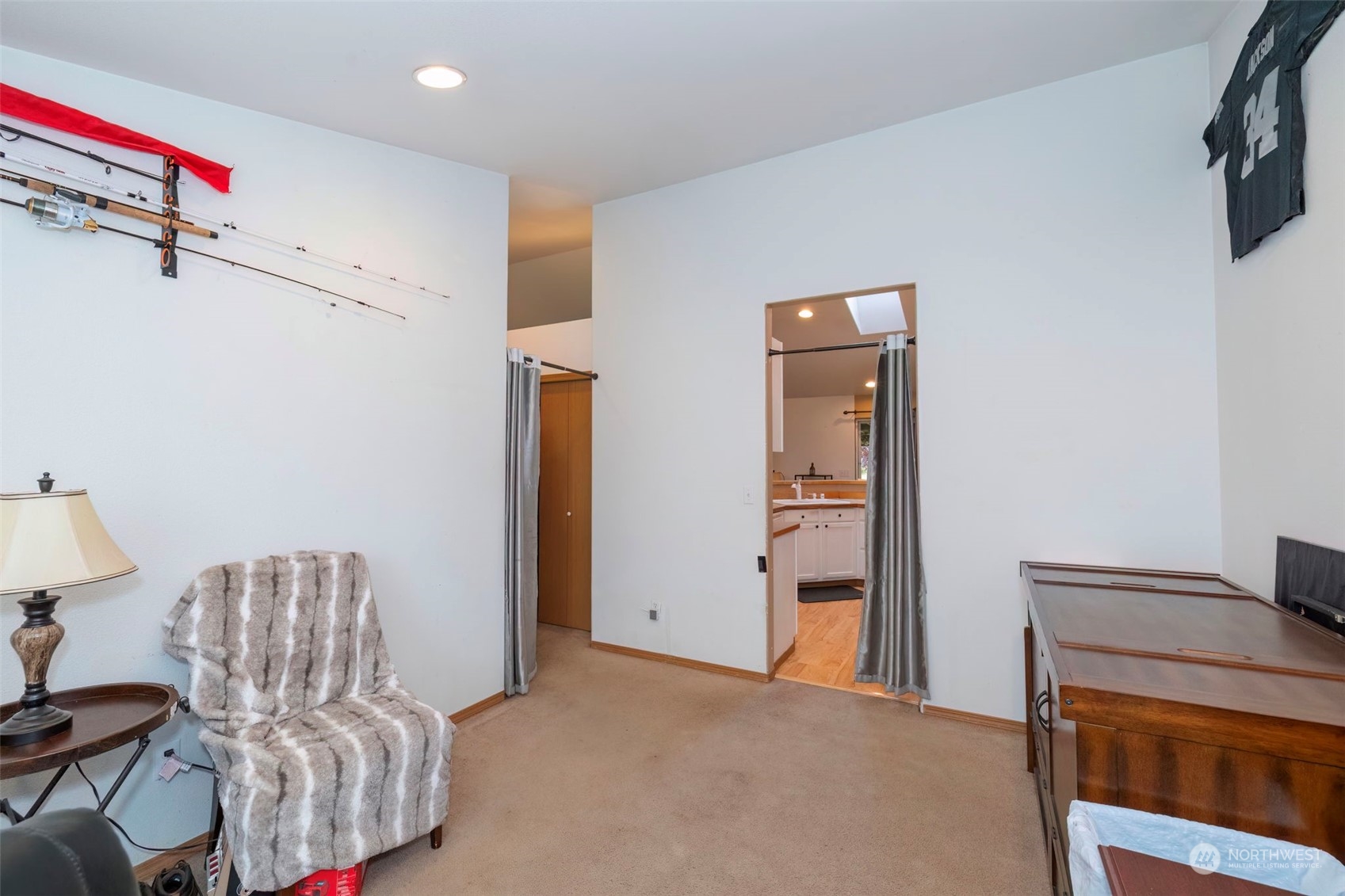 8222 178th Avenue Southwest Rochester, WA 98579 - Photo 15 of 36 a bedroom with furniture and wooden floor