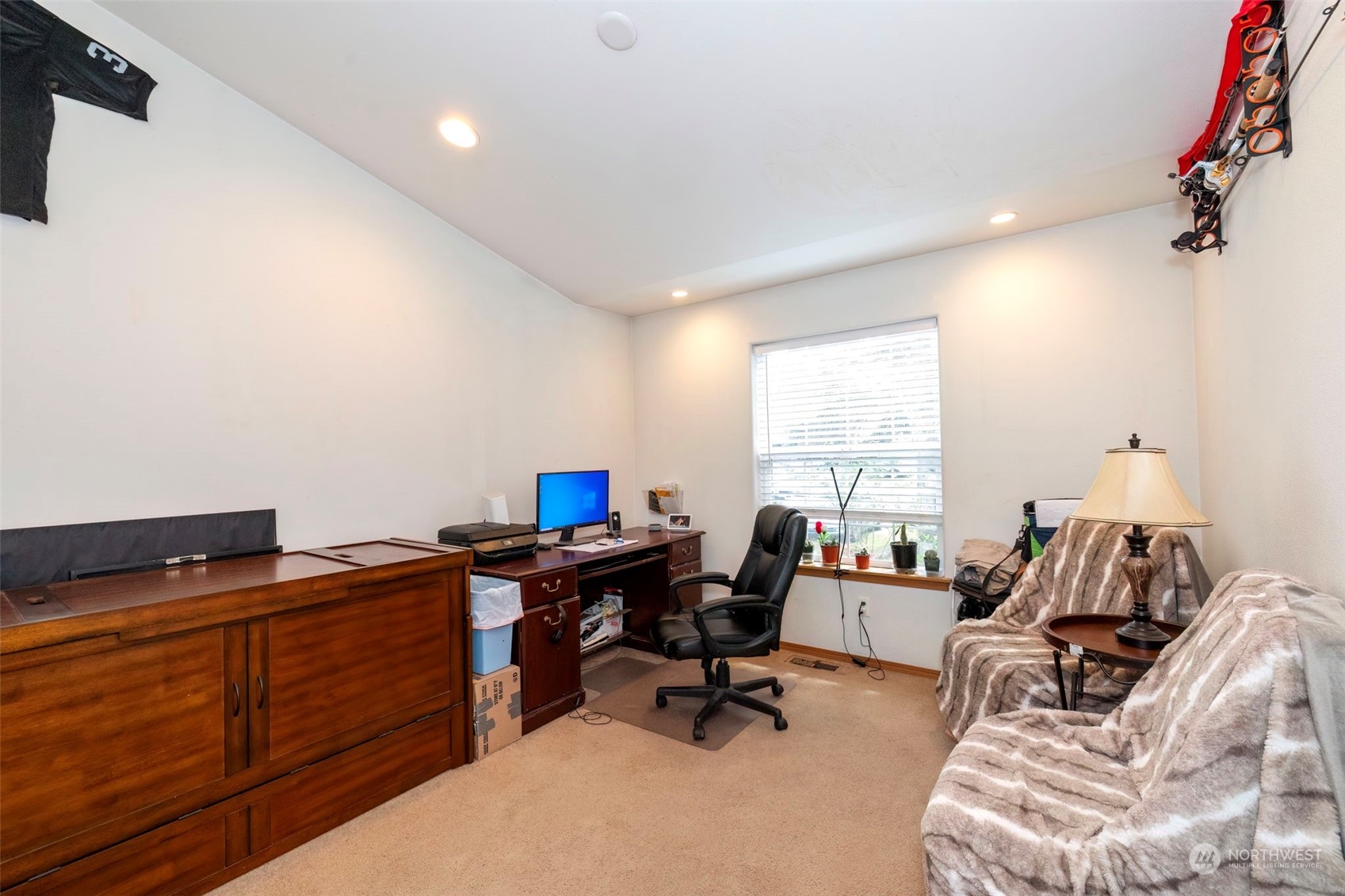 8222 178th Avenue Southwest Rochester, WA 98579 - Photo 16 of 36 a view of a workspace with furniture and a window
