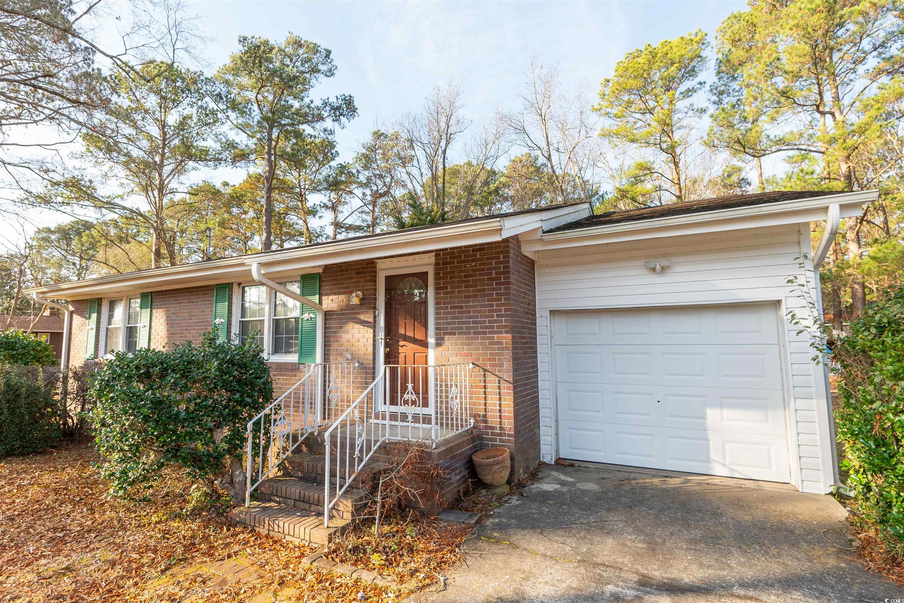 1105 Scott Drive Myrtle Beach, SC 29577 - Photo 2 of 13 Single story home with a garage