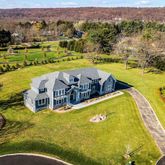 a view of a swimming pool with a lake
