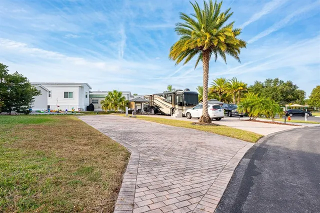 a view of yard with swimming pool