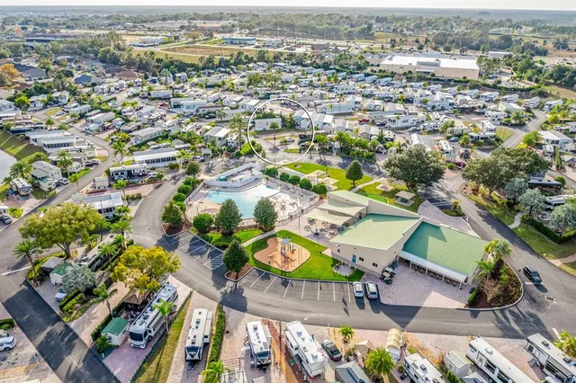 an aerial view of residential house with outdoor space and parking