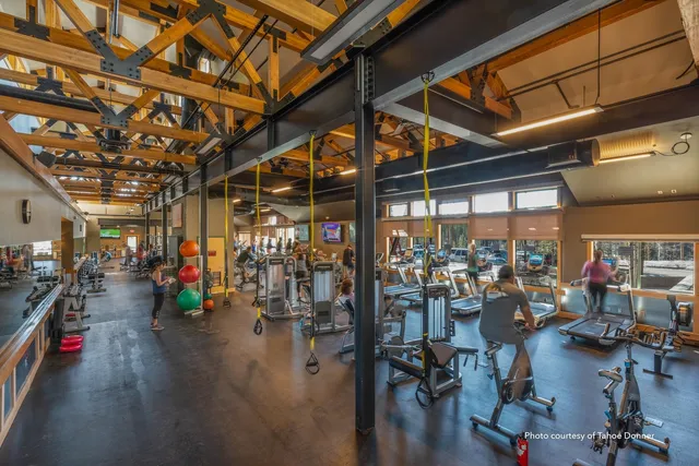 a view of a lake with outdoor seating