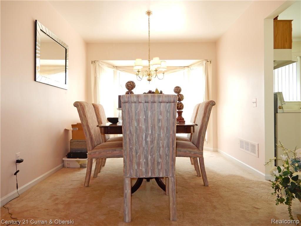 1551 Knightsbridge Road Canton, MI 48187 - Photo 6 of 26 FORMAL DINING ROOM WITH BAY WINDOW