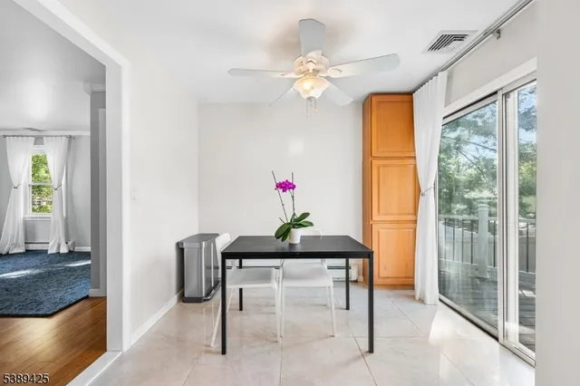a table that has a table and a chandelier in it