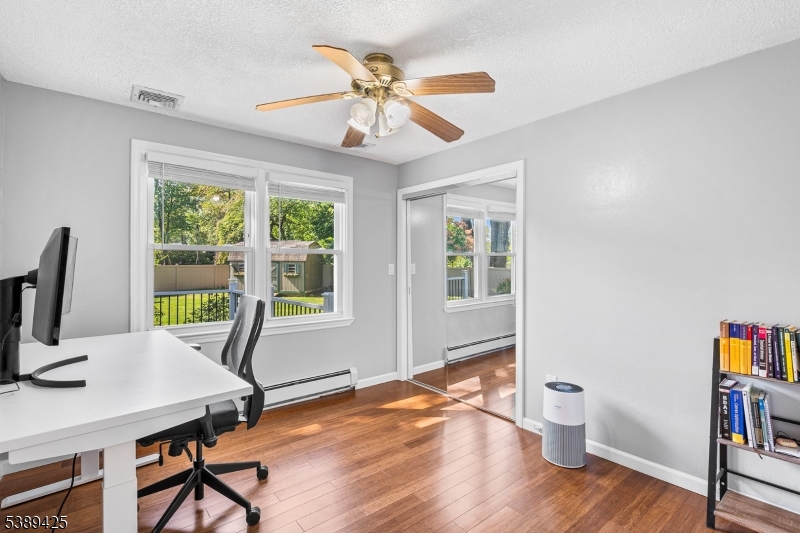 333 Old Tote Road Mountainside, NJ 07092 - Photo 29 of 48 a view of a workspace with furniture and a window