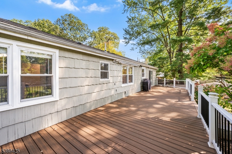 333 Old Tote Road Mountainside, NJ 07092 - Photo 42 of 48 a house with trees in the background