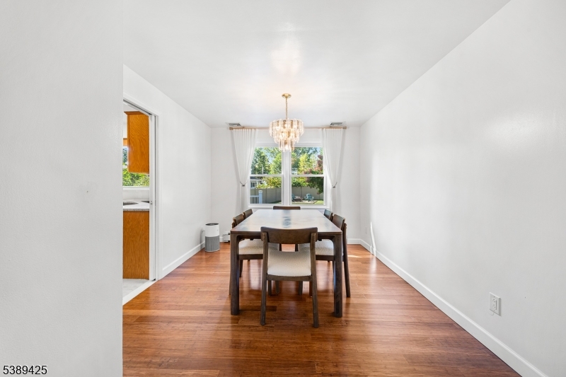 333 Old Tote Road Mountainside, NJ 07092 - Photo 9 of 48 a dining room with furniture window wooden floor